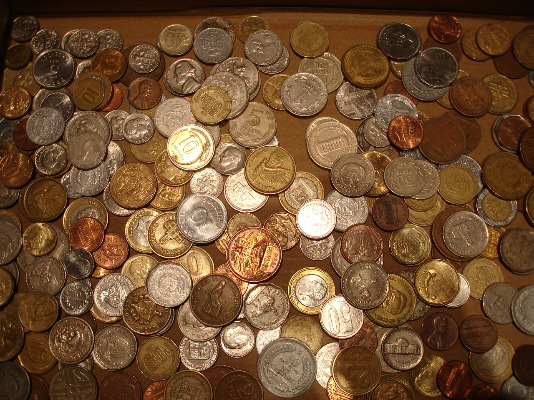 Monedas mundiales por continentes al peso